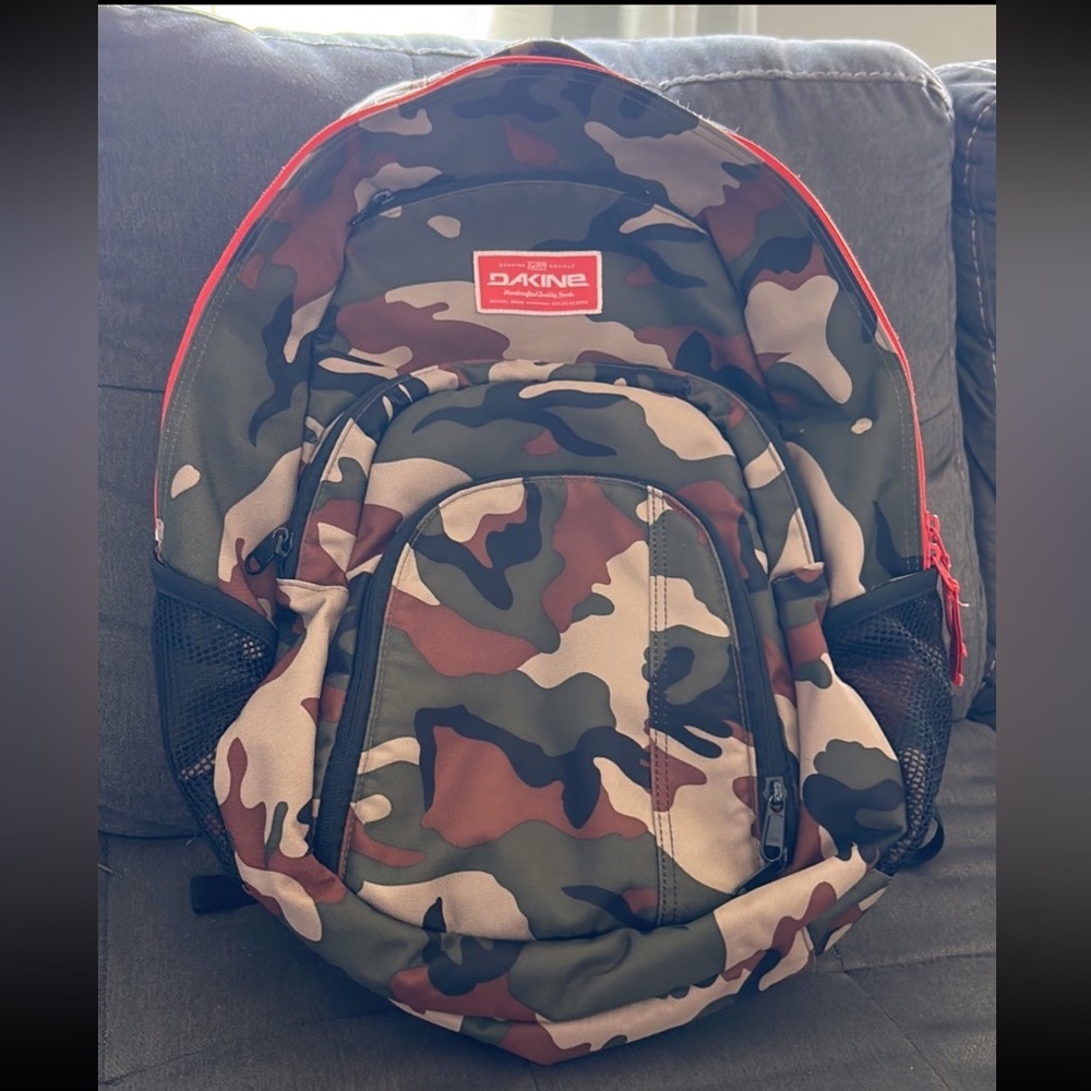 Dakine camouflaged backpack